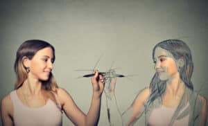 woman sketching herself