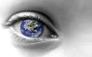 Humanism approach to counselling - a closeup of an eye with the world as the iris