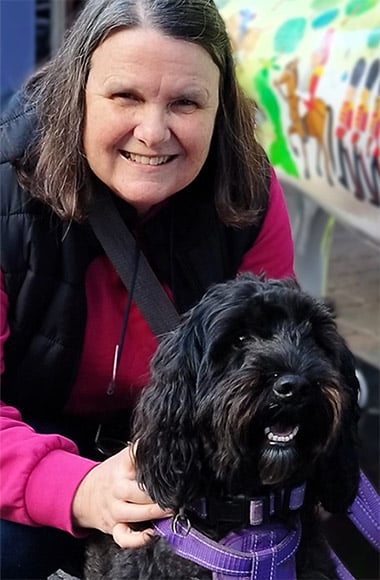 Hilary McNair and therapy dog Oscar